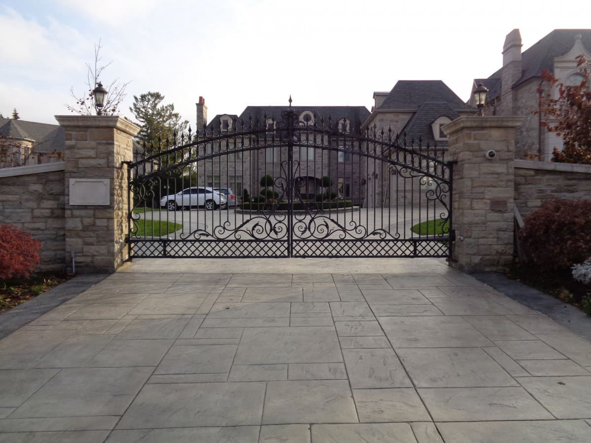 Stamped Concrete application — estate vehicular entryway
